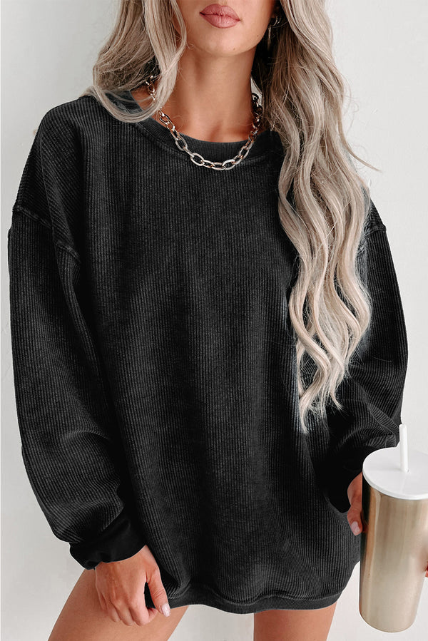 Sweat femme en maille, col rond, uni, côtelé — noir